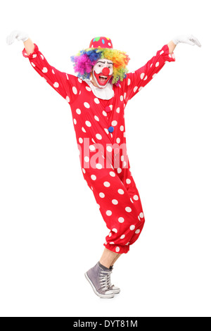 Full length portrait of a happy male clown dancing Stock Photo