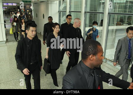 Hong Kong, China. 24th Apr, 2014. South Korean actress Lee Young Ae arrives in Hong Kong with 8 security guards around and looks tired in Hong Kong, China on Thursday April 24, 2014. © TopPhoto/Alamy Live News Stock Photo