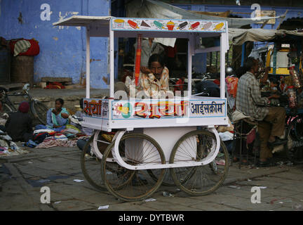 An ice-cream vendor waits for customers at a market of Jodhpur Stock Photo