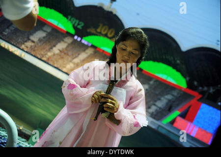 North Korean Woman with fan Stock Photo