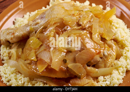 poulet yassa sénégalais.roasted chickens .Yassa is a spicy marinated food prepared with poultry.Originally from Senegal, Stock Photo