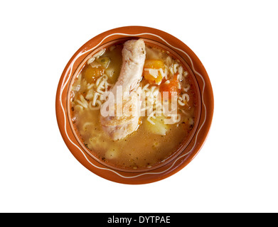 Baby menu.Chicken soup alphabet pasta closeup.isolated Stock Photo
