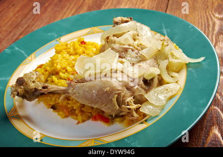 poulet yassa .roasted chickens .Yassa is a spicy marinated food prepared with poultry.Originally from Senegal, Stock Photo