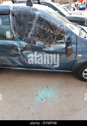 broken window of car during road accident on urban street Stock Photo