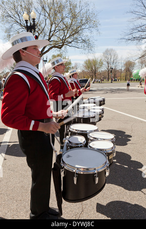 High school band marching drums section in parade (snare drums, tenor drums) - USA Stock Photo