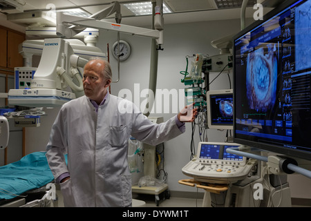 Berlin, Germany, Prof. Dr. Dietrich Andresen, Chief Physician of Vivantes Klinikum Am Urban, in the hybrid OR Stock Photo