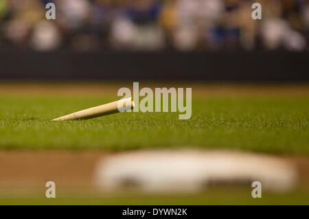 Milwaukee, Wisconsin, USA. 25th Apr, 2014. April 25, 2014: A broken bat sticks into the turf in the infield during the Major League Baseball game between the Milwaukee Brewers and the Chicago Cubs at Miller Park in Milwaukee, WI. Brewers defeated the Cubs 5-2. John Fisher/CSM/Alamy Live News Stock Photo