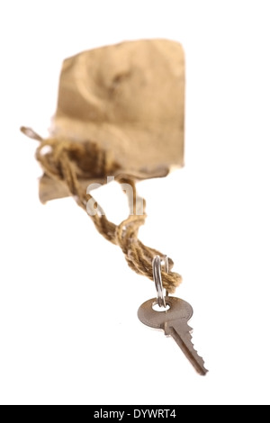 Close up shot of a used key and a tag. Stock Photo