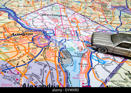 Model sedan on a map of Washington, DC.