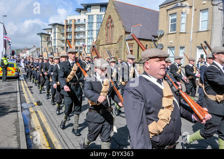Larne, Northern Ireland. 26 Apr 2014 - A parade, with over 3000 participants, was held in honour of the centenary of gun-running, when 50,000 guns and ammunition were brought into Northern Ireland to arm the Ulster Volunteer Force (UVF) Credit:  Stephen Barnes/Alamy Live News Stock Photo