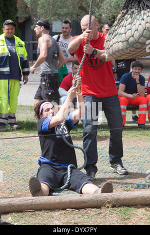 Rome, Italy. 26th Apr, 2014. Spartan Race is a 'strong effort' race that involve more than 3000 athletes, mainly amateur and not professionals. Firs time in Italy, the race have obstacles as walls to climb, nets, game e weight lifting Credit:  Francesco Gustincich/Alamy Live News Stock Photo