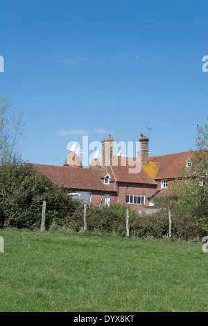 View of hop farm with oast houses and outbuildings near Lamberhurst in Kent. Stock Photo