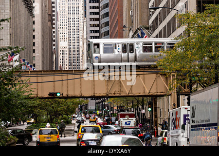 Elevated train known as the L crossing LaSalle Street in Chicago, IL. Stock Photo