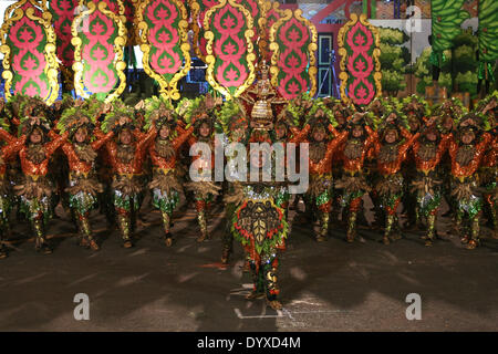 A performer raises a statue of baby Jesus, locally known as Sto. Nino, while performing during the Aliwan Festival in Manila. Dubbed as the grandest festival in Manila, thousands of people flocked to the CCP Complex in Manila to watch the annual Aliwan Grand Festival. The festival celebrates the local fiestas of the different provinces in the Philippines. (Photo by J Gerard Seguia / Pacific Press) Stock Photo