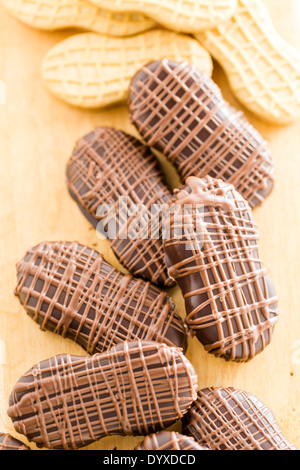 Gourmet Chocolate covered Nutter Butters with chocolate design on top. Stock Photo