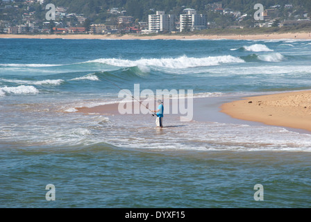 A man fishing at North Narrabeen beach. Stock Photo