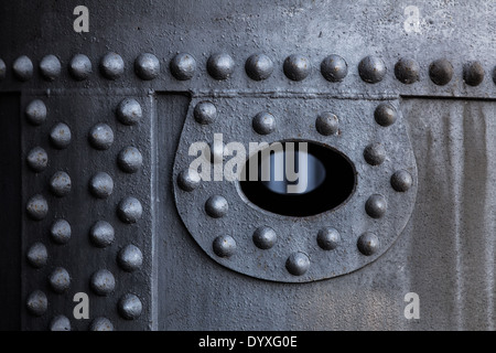 Beautiful metalwork on a tank in an abandoned factory Stock Photo