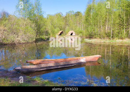 Dougout canoes on a lake Stock Photo