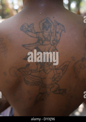 Monk with Buddhist tattoos Lolei Temple ( Roluos Group ) , Siem Reap, Cambodia Stock Photo