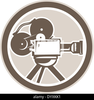 Illustration of a vintage movie film camera viewed from side set inside circle shape done in retro style. Stock Photo