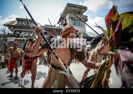 Banaue, Philippines. 27th Apr, 2014. Ifugao tribesmen perform a ritual dance during the Imbayah festival in Banaue town, Ifugao province, northern Philippines, April 27, 2014. The Imbayah festival is a celebration of Ifugao culture and thanksgiving, a gathering of the many tribes that make up the population of the Ifugao Rice Terraces, a UNESCO World Heritage site.Photo: Ezra Acayan/NurPhoto Credit:  Ezra Acayan/NurPhoto/ZUMAPRESS.com/Alamy Live News Stock Photo