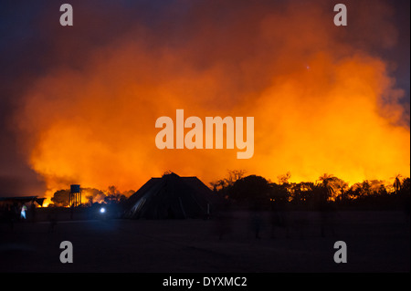 Xingu Indigenous Park, Mato Grosso, Brazil. Aldeia Matipu. Fire in the cerrados  forest dangerously close to the village. Stock Photo