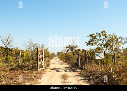 Mato Grosso State, Brazil. Entrance to the Indigenous Park of the Xingu with FUNAI sign'Protected Land, no access for strangers'. Stock Photo