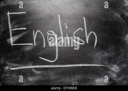 Learning language - English. Blackboard education concept. Handwritten message on a school chalkboard writing English Stock Photo