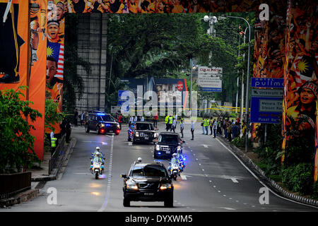Kuala Lumpur, Malaysia. 27th Apr, 2014. U.S. President Barack Obama's motorcade leaves the University of Malaya in Kuala Lumpur, Malaysia, Sunday, April 27, 2014. With the first visit to Malaysia by a U.S. president in nearly half a century, Obama holds economic and security talks with Malaysian Prime Minister Najib Razak, who leads a southeast Asian nation with an important role in Obama's efforts to forge deeper ties with the region. © Joshua Paul/NurPhoto/ZUMAPRESS.com/Alamy Live News Stock Photo