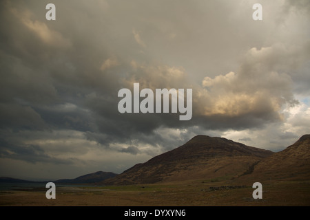 Dark clouds gather over Ardmeanach Peninsula on the West coast of the Isle of Mull, Inner Hebrides,Scottish Highlands,Scotland. Stock Photo
