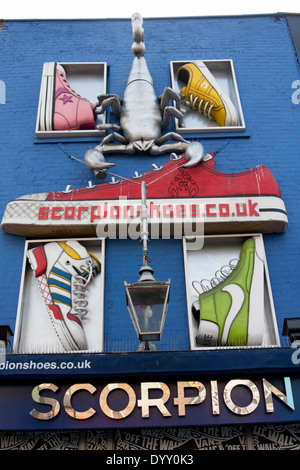 Scorpion Shoes shop on Camden High Street with shoe and scorpion sculptures brands branding London England UK Stock Photo