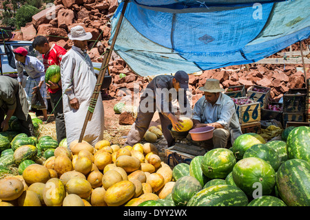 Man selling Melons on the market in Zat valley in the High Atlas Mountains, Morocco, Africa Stock Photo