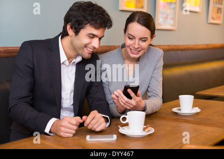 Female male coffee bar cell phone Stock Photo