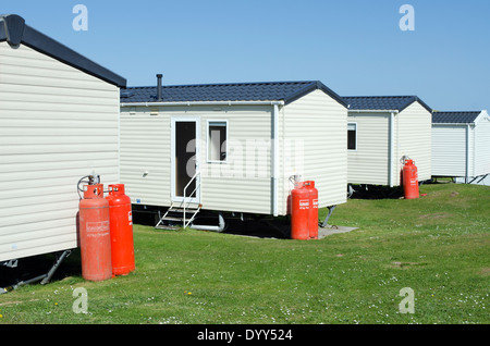 holiday caravans with propane gas bottles for fuel supply Stock Photo