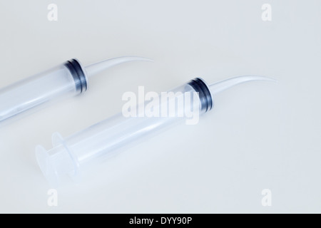 A view of a curved tip syringe. Stock Photo