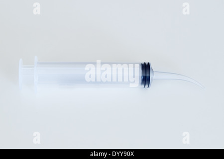 A view of a curved tip syringe. Stock Photo