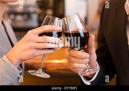 male female cheers alcohol bar Stock Photo