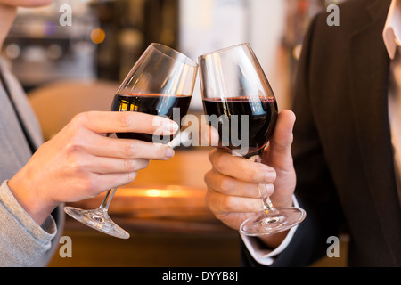 male female cheers alcohol bar Stock Photo