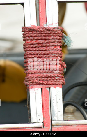rope used to hold the doors together on a banger racing demolition derby car Stock Photo