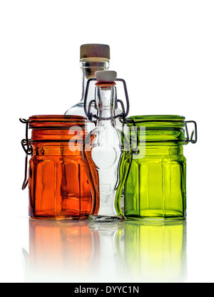 Empty glass jars and empty little glass bottles isolated on white background Stock Photo