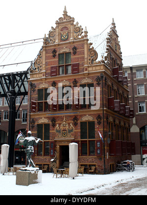 Goudkantoor (Gold Office)  on the Grote Markt (main square) in Groningen, The Netherlands in the snow in winter Stock Photo