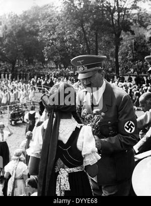 Adolf Hitler with a well-wisher on his 50th birthday, 1939 Stock Photo