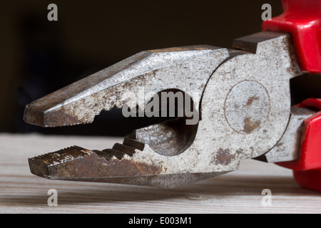 detail of combination pliers with dark background Stock Photo