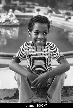 A colored boy in Germany, 1950's Stock Photo