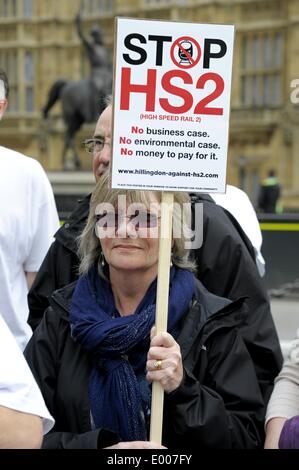 28/04/2014. London: Anti-HS2 campaigners demonstrate outside parliament  to convince MPs to vote against the HS2 bill.   Demonstrators were lead by Stop HS2 campaigners outside Parliament in Old Palace Yard before MPs voted on the second reading of the Hybrid Bill. The final vote on HS2 will not take place until after the next General Election.  Picture by Julie Edwards/Alamy Live News Stock Photo