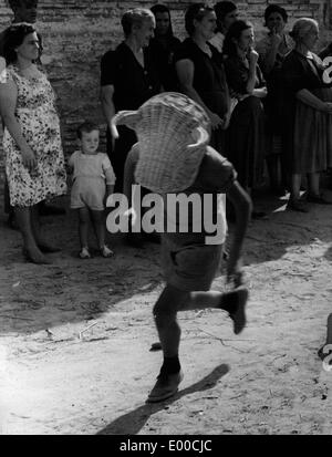 Children play bullfighting in an andalusian village Stock Photo