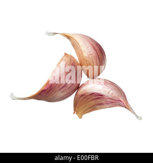 Three garlic cloves isolated on white background Stock Photo