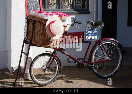 PENARTH WALES UK MARCH 2014 - View of an old tradesman bicycle outside a sweet shop in Penarth Stock Photo