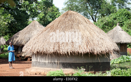 A young woman looks on in a rural area of the Lira district in northern Uganda. Stock Photo