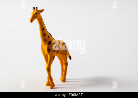 Plastic toys and figures from a play set, dinosaurs, farm animals and zoo animals Stock Photo